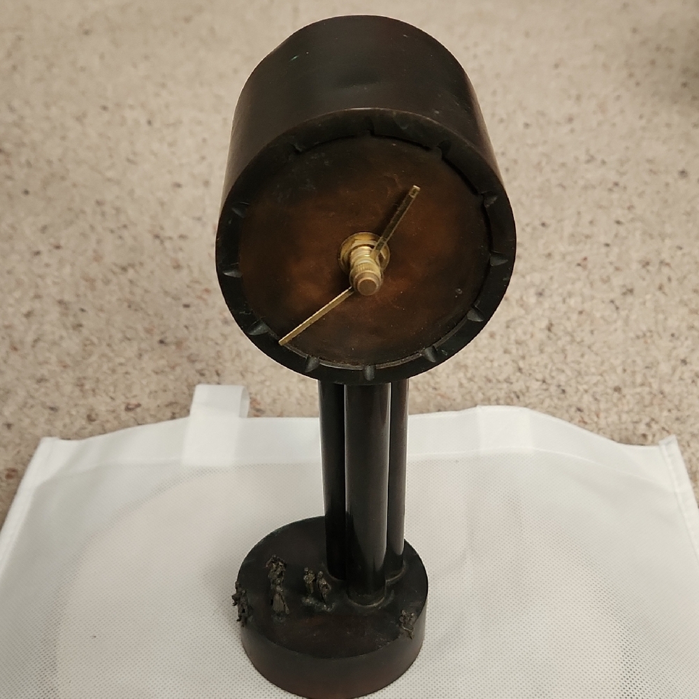Vintage Winged Camel Metalworks Owen Tall Metal Clock With Tiny Figures